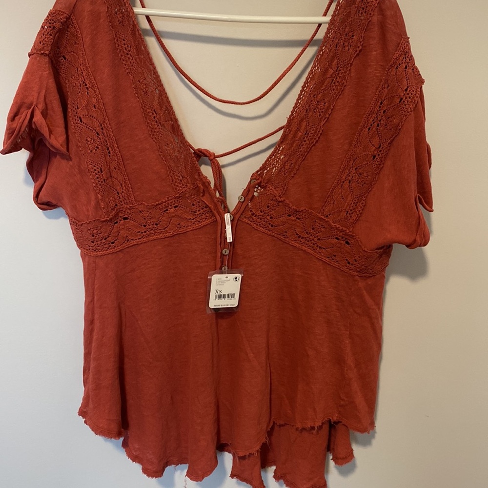 NWT Free People oversized top Beautiful crochet detail. Raw hem